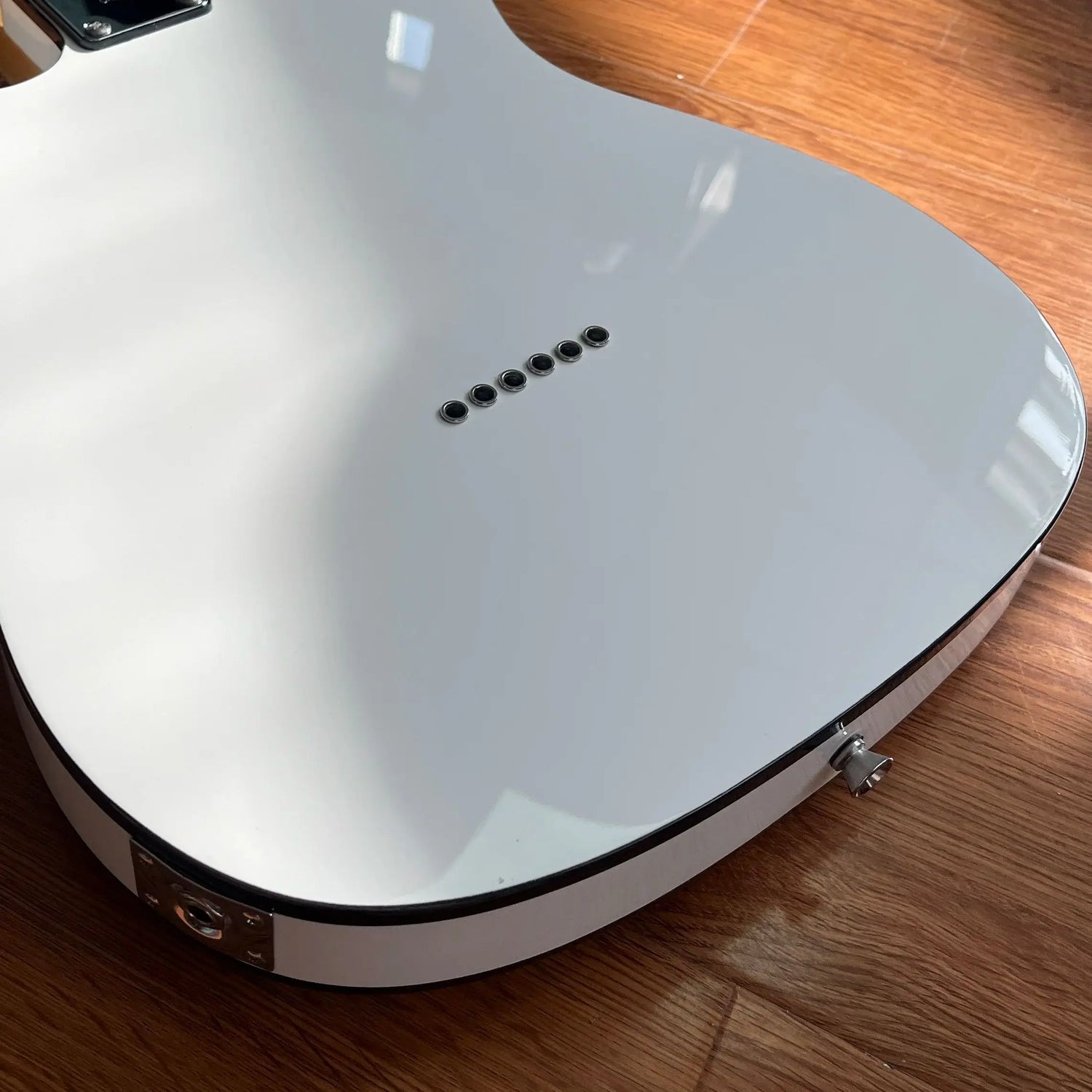 White Electric Guitar With Maple Neck Chrome finish Ash wood body of sturdy quality Free shipping.